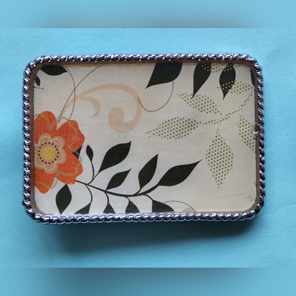 Vintage metal floral Buckle with an orange flower and silver trim